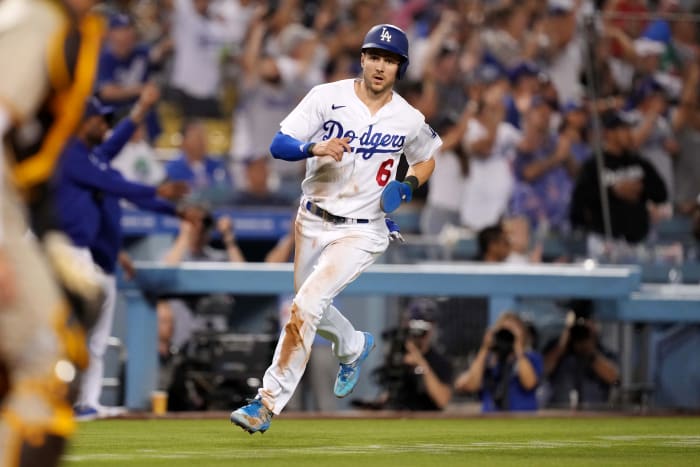 Dodgers shortstop Trea Turner rounds third base to score in the eighth inning against the Padres at Dodger Stadium.